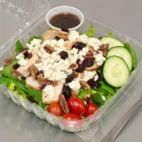 Cranberry Pecan Chicken Salad · Grilled chicken, sweet dried cranberry, pecan, blue cheese, tomatoes and cucumbers.