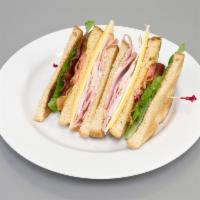 Blue Tower Club Sandwich · Ham, turkey, bacon, Swiss and cheddar cheese, lettuce, tomatoes, honey mustard and mayo on 3...