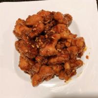 C49. Orange Chicken · Battered and cooked in a sweet orange sauce.