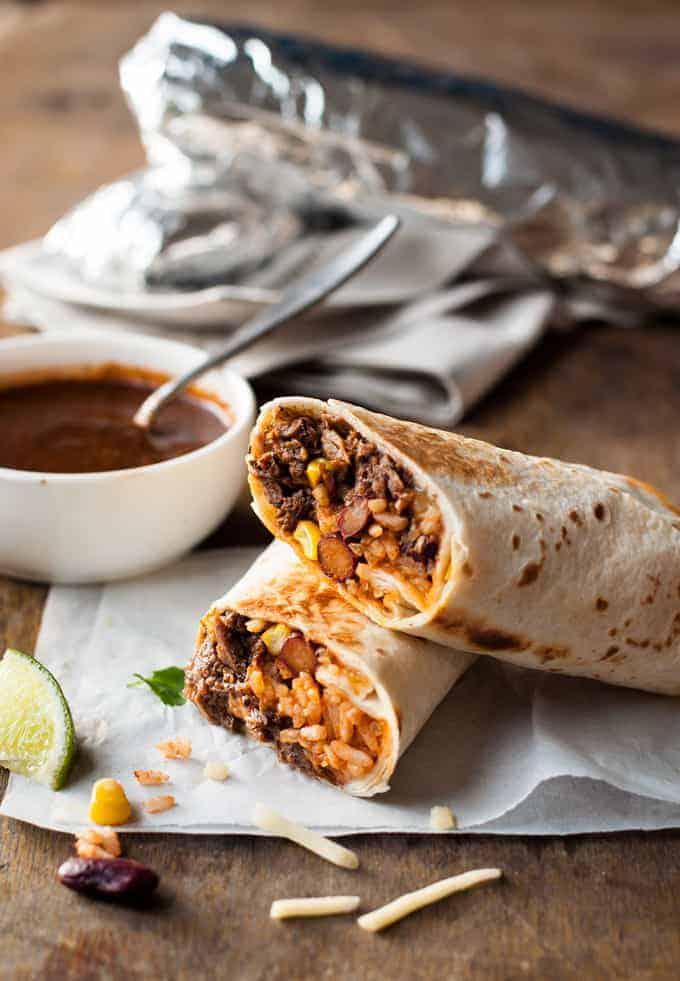 Lamb Burrito · grilled Lamb & Beef ,tortilla bread , rice ,tomatoes, onion,green papper
white sauce & hot sauce