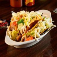 Tres Tacos Dorado Combo  · 3 crispy hard tacos with lettuce, tomatoes, suizo cheese, and a bottle or can of soda