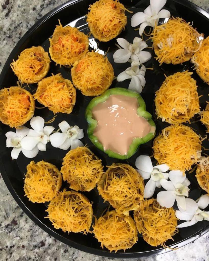 Mofonguitos · 3 or 6 deep fried plantain cups stuffed with your choice of meat, 
shredded cheese, and rose sauce.
