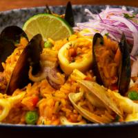 Arroz con Mariscos · Peruvian style seafood paella and salsa criolla.