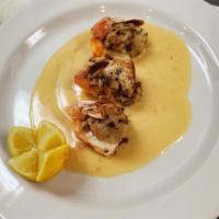 Blue Lump Crab Stuffed Shrimp · 3 large shrimp stuffed and topped with sun-dried tomato sauce.