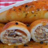 40. Calamarer Rellenos / Stuffed squid · Squid  stuffed with roasted meat, in a homemade tomato sauce, with white.