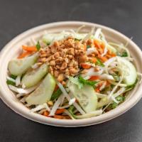 Cabbage Salad · Cabbage, carrot, cucumber, cilantro & peanuts in Thai vinaigrette.