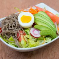 Avocado Salad · Mixed greens, soba noodles, avocado, radish, tomatoes, egg, carrots, corn.