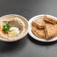 Hummus with Egg  · Dip made from chickpeas.