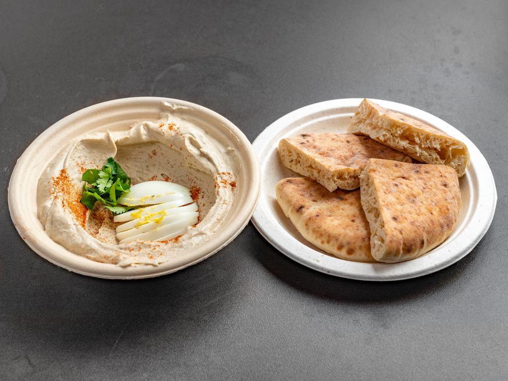 Hummus with Egg  · Dip made from chickpeas.