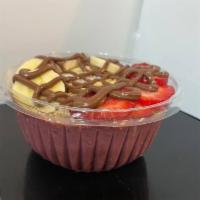 77. Bella Nutella Acai Bowl · Acai blended with strawberry, banana and vanilla yogurt, milk or almond milk. Toppings -gran...
