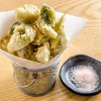Brussels Sprout Tempura Tapas · Brussels sprout tempura, white truffle oil and Himalayan pink salt.
