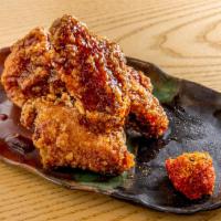 Tebasaki Buffalo Chicken Tapas · Fried chicken wing with house made spicy sauce.