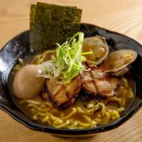 Shuya Ramen · Chicken and fish and clam soup, pork chashu and flavored egg.