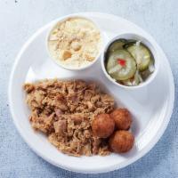 Pulled Chicken Plate · Served with a bun or 2 hushpuppies, 2 sides and sauce on the side.