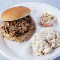 Pulled Brisket Combo · Pulled Brisket sandwich with slaw on side and 1 side item