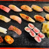 omakase deluxe   · 14 piece with toro and scallions roll (this order take more time to prepare)