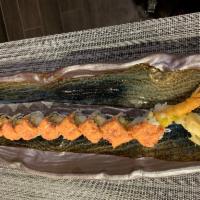 Astoria Roll4 · Shrimp tempura with cucumber inside, spicy tuna on top and eel sauce.