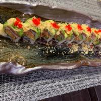 Fancy Q Roll · Spicy tuna and avocado, topped with tuna, avocado, fluke and tobiko, chefs special sauce.