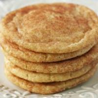 Snickerdoodle Cookies  · Similar to a sugar cookie but its dipped in a Cinnamon and Sugar mixture and baked until it ...