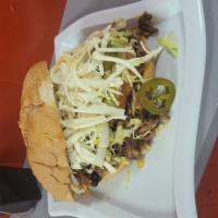 TORTA · lettuce tomato black bean chihuahua cheese onion pickled homade jalapenos and mayonnaise