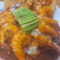 Camarones A La Diabla  · Shrimp cooked in spicy sauce served with rice and tostadas 