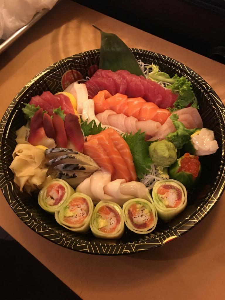 Sashimi Deluxe Platter Entree · 42 pieces of assorted raw fish. Served with miso soup or salad.
