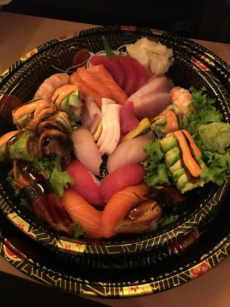 Sushi Sashimi Combo for Two Entree · 10 pieces of sushi, 15 pieces of sashimi and special roll. Served with miso soup or salad.