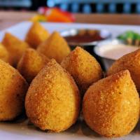 Chicken Croquettes (Coxinha de Frango) · A popular and savory finger food in Brazil. It’s molded into a teardrop shape and it’s filli...