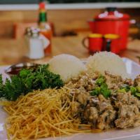 Mama's Stroganoff (Stroganoff da Mama) · Creamy sauce with your choice of meat and spices on top of fresh cooked rice and your choice...