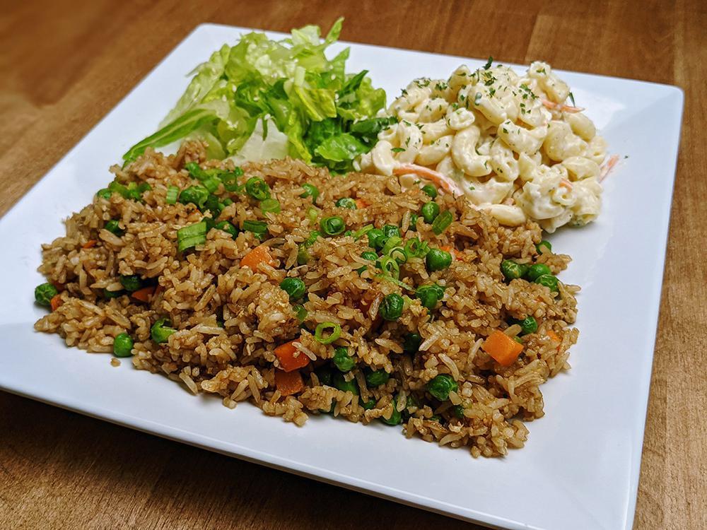 Fried Rice - Vegetarian (Arroz Frito - Vegetariano) · Delicious steamed rice stir-fried with egg, carrot and peas. Served with a scoop of mac salad and romaine salad.