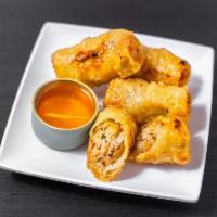 1. Cha Gio · 4 rolls. Vietnamese fried spring rolls, served with lettuce and herbs.