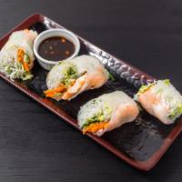 5. Goi Cuon · 2 rolls. Fresh shrimp summer roll. Shrimp, mint leaves and vermicelli noodles wrapped in ric...