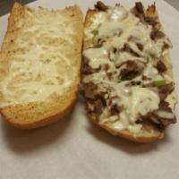 Philly Cheese Steak Sub · Philly meat, grilled onions, green peppers, mushrooms, mayonnaise and mozzarella cheese. Ser...