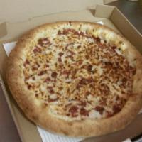 Philly Cheese Steak Pizza · Grill sauce to replace our marinara sauce, delicious Philly meat, grilled onions, green pepp...