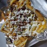 Deluxe Chili Fries · Crinkle cut fries topped with chilli, bacon, ranch, cheddar and mozzarella cheese (jalapenos...