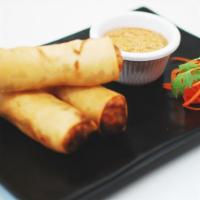 Crispy Spring Rolls · Carrot, basil, cabbage, and vermicelli, with lime-mustard seed sauce.