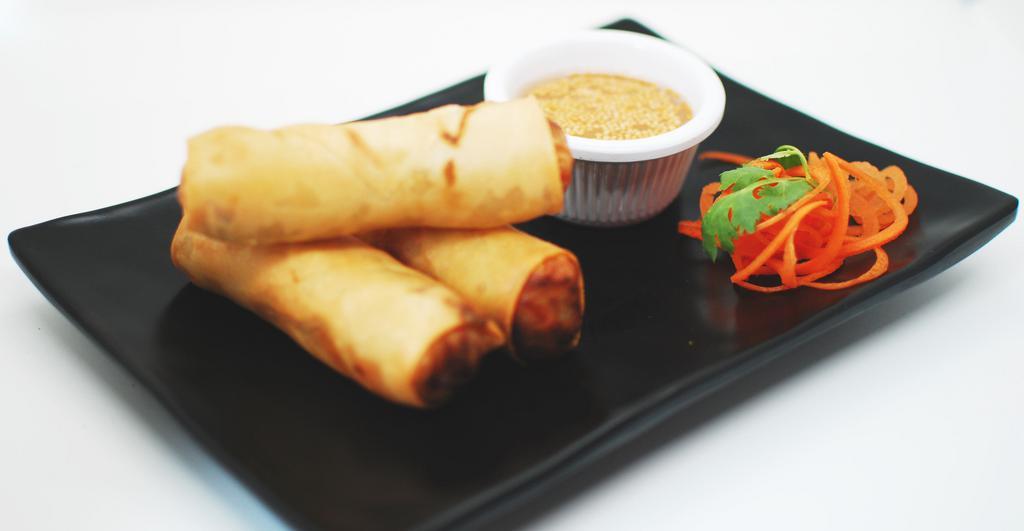 Crispy Spring Rolls · Carrot, basil, cabbage, and vermicelli, with lime-mustard seed sauce.