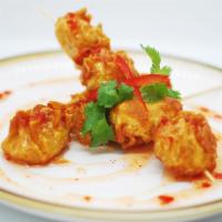 Golden Fritters · Minced shrimp and chicken with sweet chili sauce.