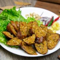Sai Oua Sausage  · Northern style herbed pork sausage, fresh ginger