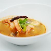 Lemongrass Tom Yum Soup · Spicy and sour soup with mushroom and onion.