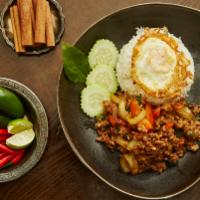 Kao Pao Moo Sub · Ground pork , basil with fresh chili, holy basil, garlic, karma son-in-law egg, and fish sau...