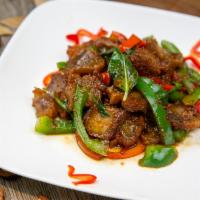 Spicy Crispy Pork Belly · Sauteed onion, bell pepper, and holy basil.