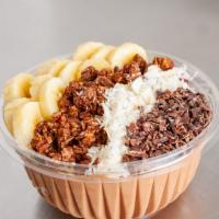 Chocolate PB DELIGHT Bowl · Base: Organic Cacao, Peanut Butter, Banana, Organic Coconut milk
Toppings: Organic Cacao-Sup...