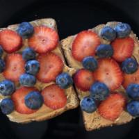 Peanut butter & berries toast · served on a 12 grain bread