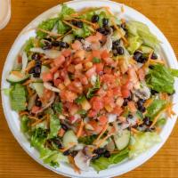 Baja Salad · Mixed greens, mushrooms, black beans, onions, cucumbers, carrots and pico de gallo with choi...