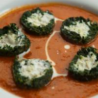 Shyam Savera · Homemade Indian cheese balls coated with spinach and cooked in creamy tomato sauce.
