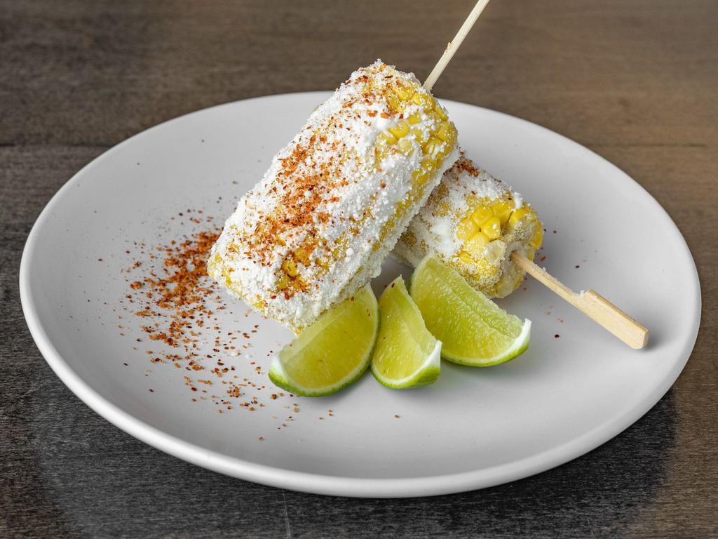 Elote Starter · Mexican corn on the cob Cotija cheese, mayo, and tajin pepper.