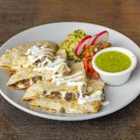 Flour Tortilla Quesadilla · Griddled flour tortillas with our mix of four different Mexican cheese. Served with salsas, ...
