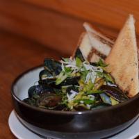 Coconut Curry Mussels · Caribbean curry spices, coconut milk slowly poached with the sweetness of mussels, come toge...
