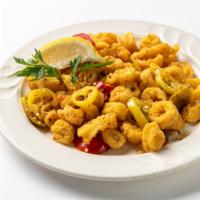 Fried Calamari · Lightly battered calamari rings tossed with hot peppers in a garlic sauce.